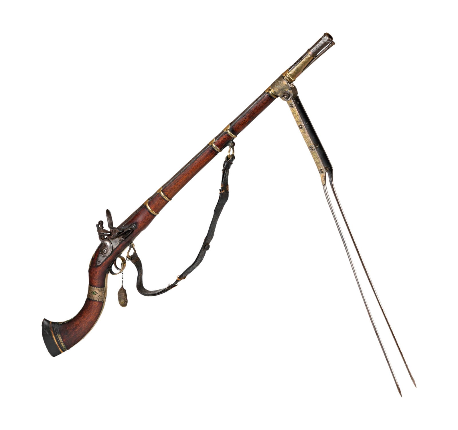An Antique Afghan Long Rifle with Brass Bipod: 19th century, with engraved barrel and brass mounts 44 in. (111.8 cm.) wide Notes: This item does not qualify for in-house shipping. Please see our preferred shippers' list for quotes or arrange for l
