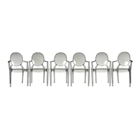 A Set of Six Philippe Starck-Style Black Acrylic Stackable Armchairs