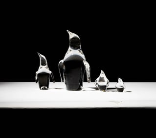 Four Steuben Glass Penguin Sculptures