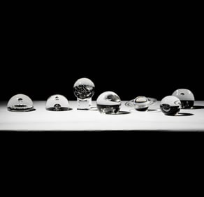 Group of Seven Steuben Glass Spherical Sculptures