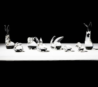 Eight Steuben Glass Rabbit Sculptures