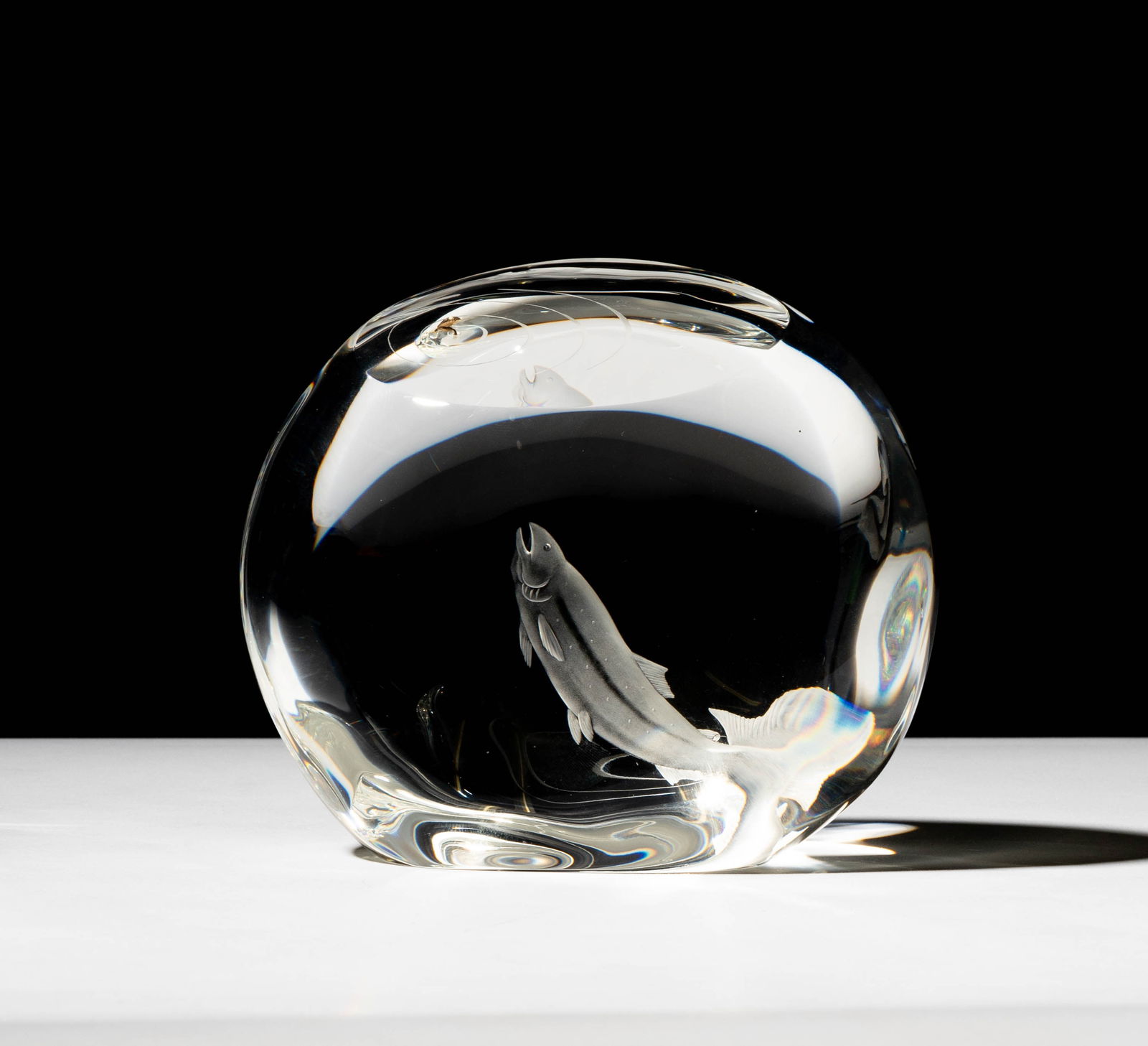 Steuben Glass and 18k Gold Salmon Pool Sculpture: designed by James Houston; signed; 5 1/4 x 6 1/2 x 3 1/2 in. (13.3 x 16.5 x 8.9 cm.); ; Provenance: The collection of Santa Barbara Steuben collector Joel Kreiner