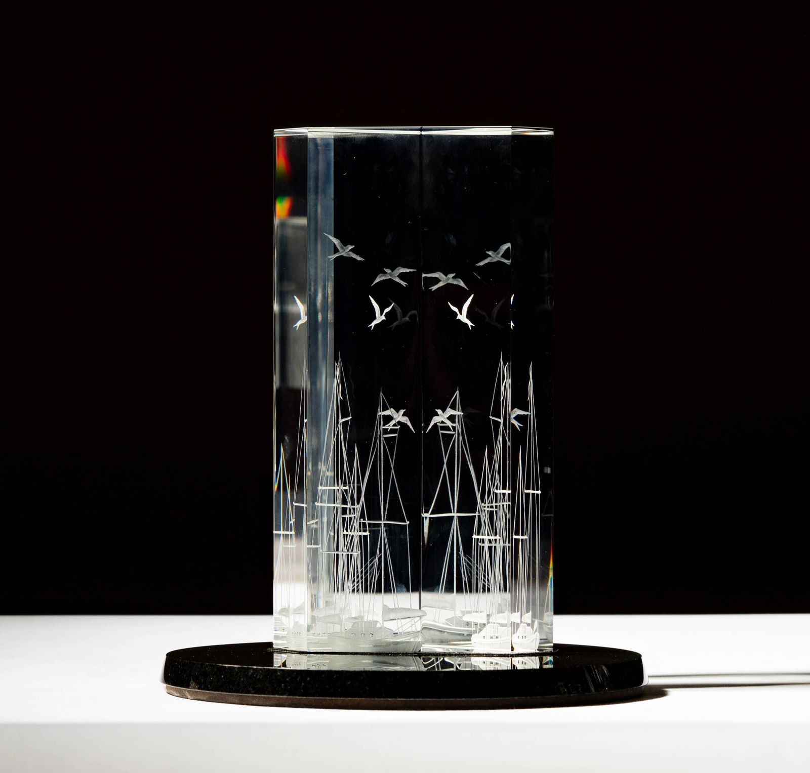 Steuben Glass Harborside Sculpture: designed by Robert Cassetti and Donald Demers; on black granite base; signed; Overall: 8 3/8 x 7 in. (21.3 x 17.8 cm.); ; Provenance: The collection of Santa Barbara Steuben collector Joel Kreiner