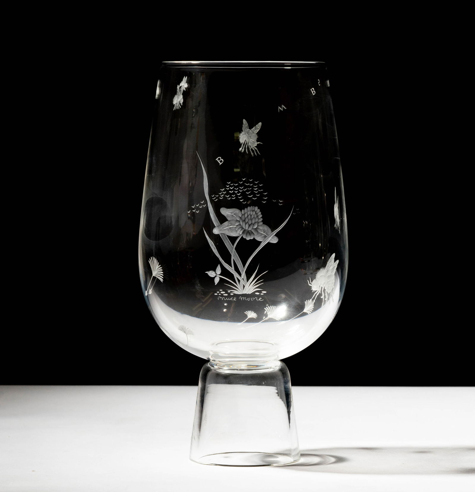 Steuben Glass Bombus Vase: designed by Bruce Moore; signed "Steuben" to base and "Bruce Moore" below flower; 9 3/4 x 5 in. (24.8 x 12.7 cm.); ; Provenance: The collection of Santa Barbara Steuben collector Joel Kreiner