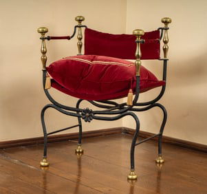 An Iron and Brass Curule-Form Armchair