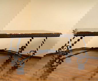 A Spanish Baroque-Style Iron and Bronze Coffee Table