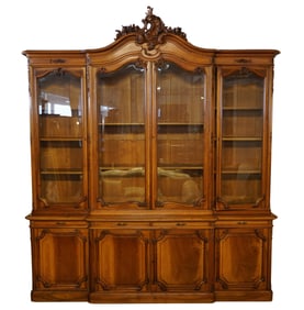 A Carved Wood Multi-Section Bookcase