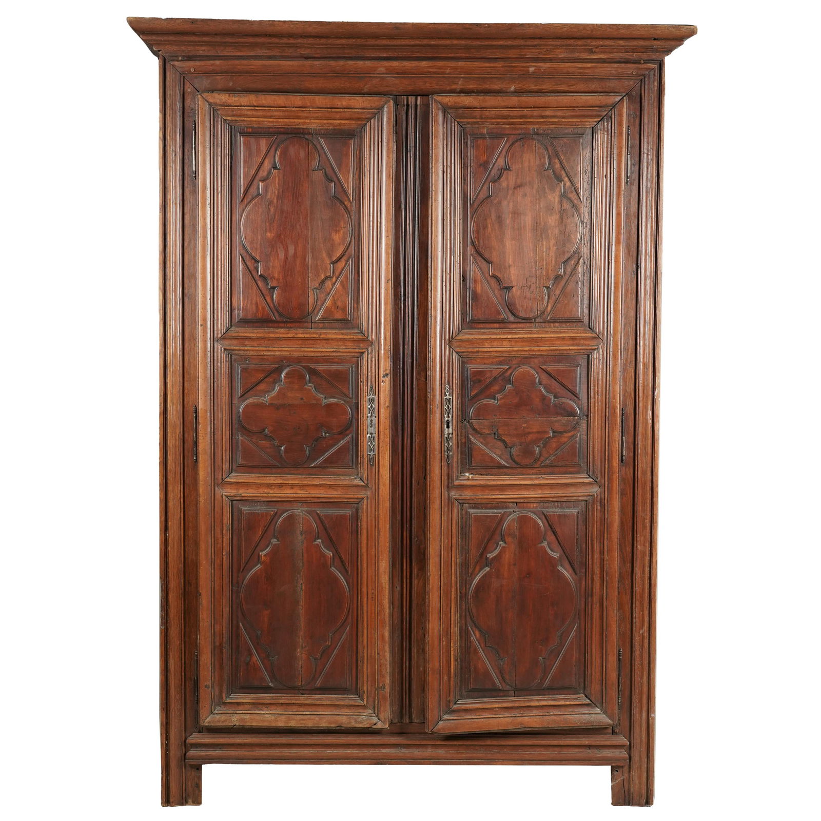 A Louis XIII-Style Walnut Armoire: France, 19th century or earlier 83 x 55 x 18 3/4 in. (210.8 x 139.7 x 47.6 cm.) Notes: This item does not qualify for in-house shipping. Please see our preferred shippers' list for quotes or arrange f