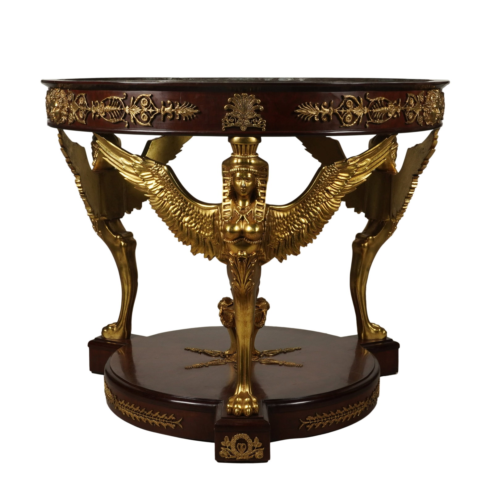 An Empire-Style Jardiniere: 20th century; with liner 35 x 42 1/2 x 42 1/2 in. (88.9 x 108 x 108 cm.) Notes: This item does not qualify for in-house shipping. Please see our preferred shippers' list for quotes or arrange for loca