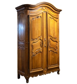 A Louis XV Provincial Walnut Armoire