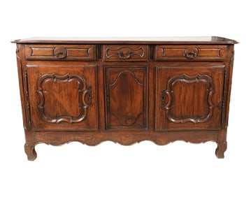 A Louis XV Provincial Oak Buffet
