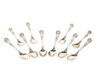 A Group of Tiffany English King Sterling Serving Spoons