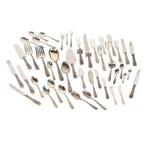 An S. Kirk and Son Repousse Sterling Flatware Service