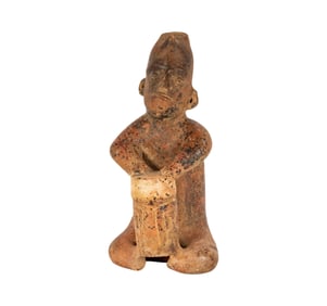 A Colima Pottery Figure of a Seated Drummer