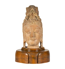 A Chinese Carved Wood Head of Guan Yin