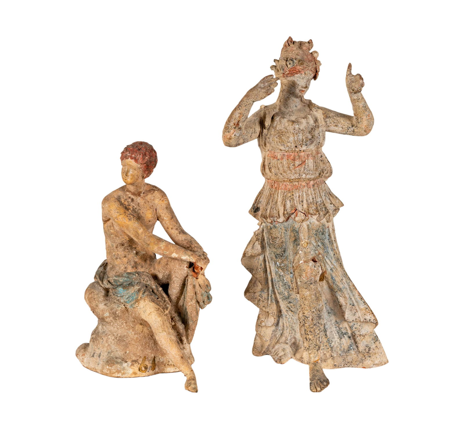 Two Hellenistique Terracotta Statues: 3rd - 1st century BC 9 3/4 in. (24.8 cm.) high and 6 1/2 in. (16.5 cm.) high Provenance: An Important Private Southern California Estate;Notes: This item does not qualify for in-house shipping. Please