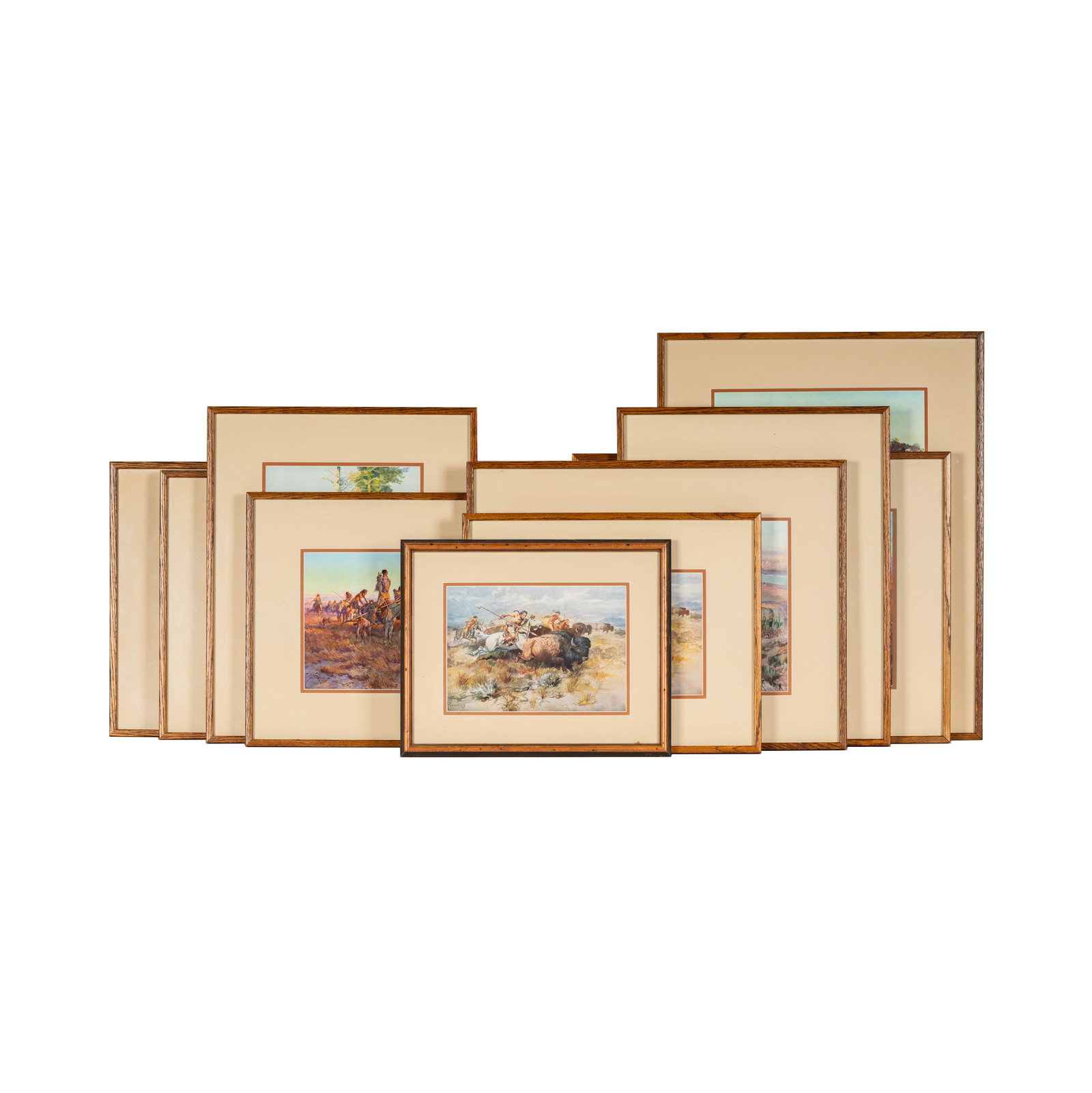 After Charles Marion Russell, 1864-1926, Ten Works: each: offset lithograph, signed in the image; Notes: This item does not qualify for in-house shipping. Please see our preferred shippers' list for quotes or arrange for local pickup. https://www.abell