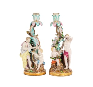 A Pair of Meissen Porcelain Figural Candlesticks