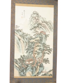 A Chinese Scroll Depicting a Mountain Landscape
