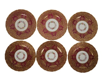 A Set of Six Red and Gilt Limoges Porcelain Chargers