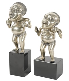 A Pair of Silvered Metal Figures