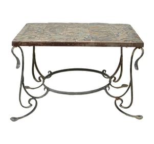 A Spanish Wrought Iron and Tunis Faience Tile Table