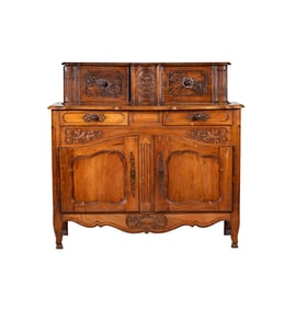 A French Provincial Carved Walnut Buffet