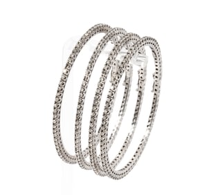 Bob Newhart: Set Of Four 18 Karat White Gold and Diamond Bangles
