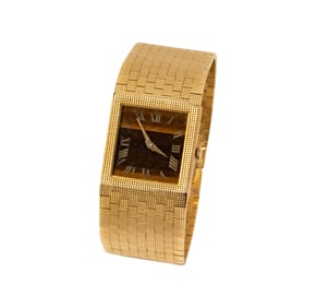 Bob Newhart: Piaget 18 Karat Gold and Tiger?s Eye Watch