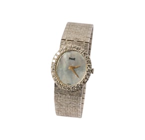 Bob Newhart: Piaget 18 Karat White Gold, Diamond, and Mother-of-Pearl Watch