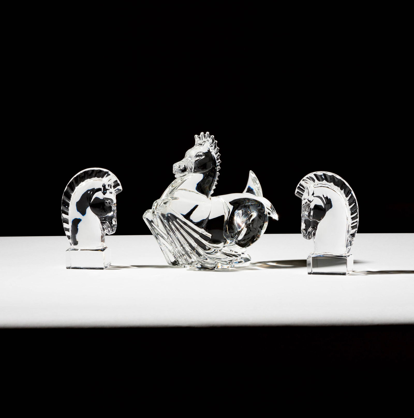 Bob Newhart: A Group of Steuben Horse-Theme Glass: comprising a pair of bookends, each with etched signature Provenance: From The Legendary Estate of Bob and Ginnie Newhart, celebrated icons of American entertainment. Bob Newhart, the groundbreaking c