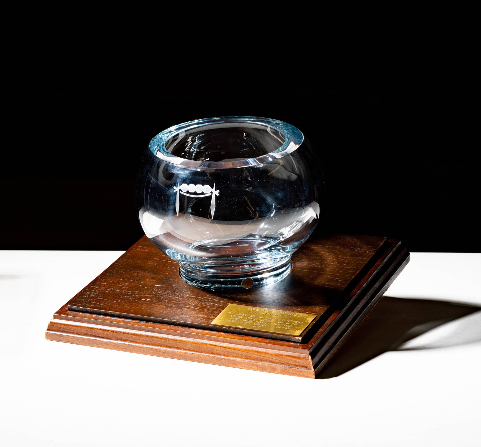 Bob Newhart: Governor's Trophy: with plaque engraved "To a performer who has made outstanding contributions to Nevada's fame as the entertainment mecca of the world / Greater Reno Chamber of Commerce / 1977" The case: 9 1/4 x 11 x 1