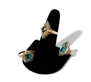 Three 14 Karat Gold and Colored Stone Rings