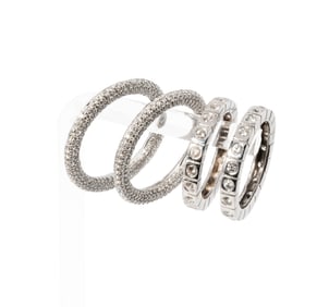 Group of Four 18 Karat White Gold and Diamond Rings and Pendants
