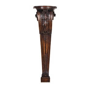 A Carved Wood Wall-Mounted Pedestal