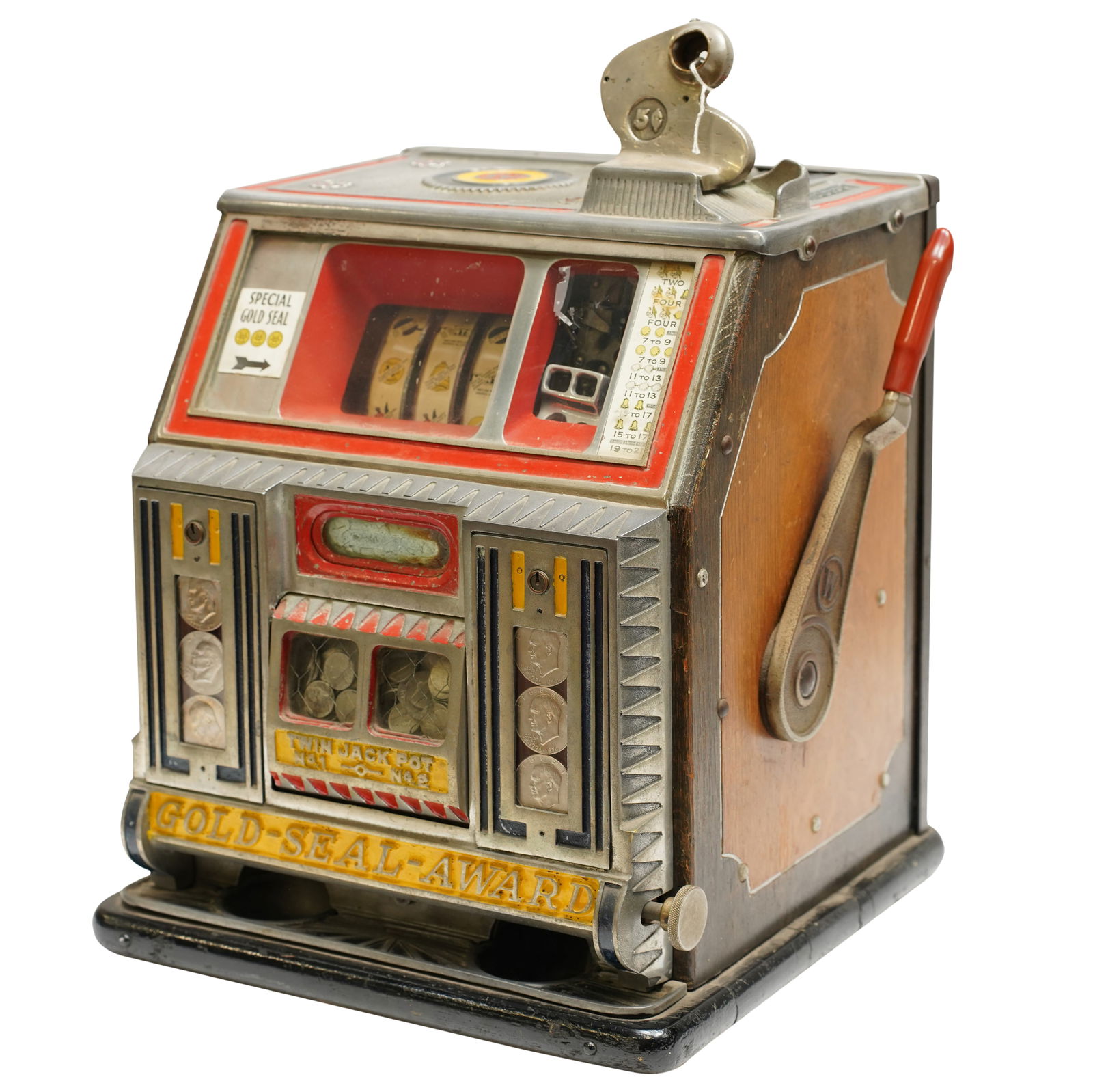 A Vintage Watling Five-Cent Slot Machine: with key 21 1/2 x 16 x 15 in. (54.6 x 40.6 x 38.1 cm.)