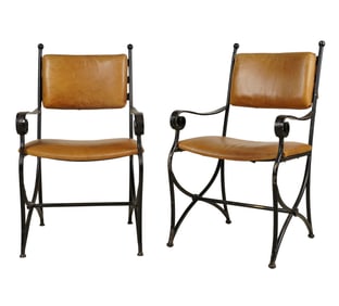 A Pair of Iron Armchairs