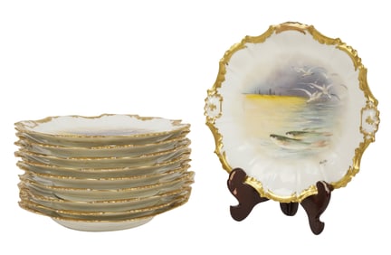 A Set of Ten Limoges Porcelain Fish Plates