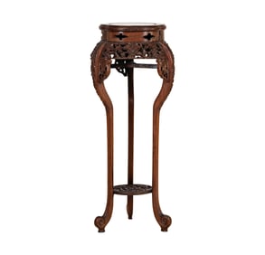 A Chinese Carved Wood Fern Stand