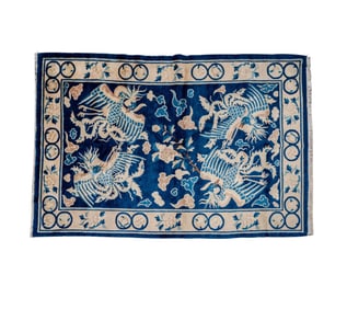 A Chinese Blue and White Rug 4' x 6'