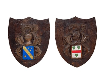 A Pair of Painted Carved Wood Coat of Arms Plaques