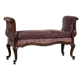 An Upholstered Carved Wood Bench