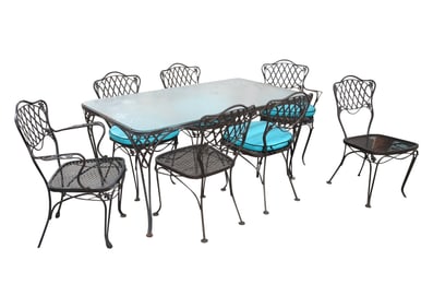 A Wrought Iron Patio Dining Set
