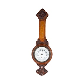 A Carved Oak Aneroid Wall Barometer