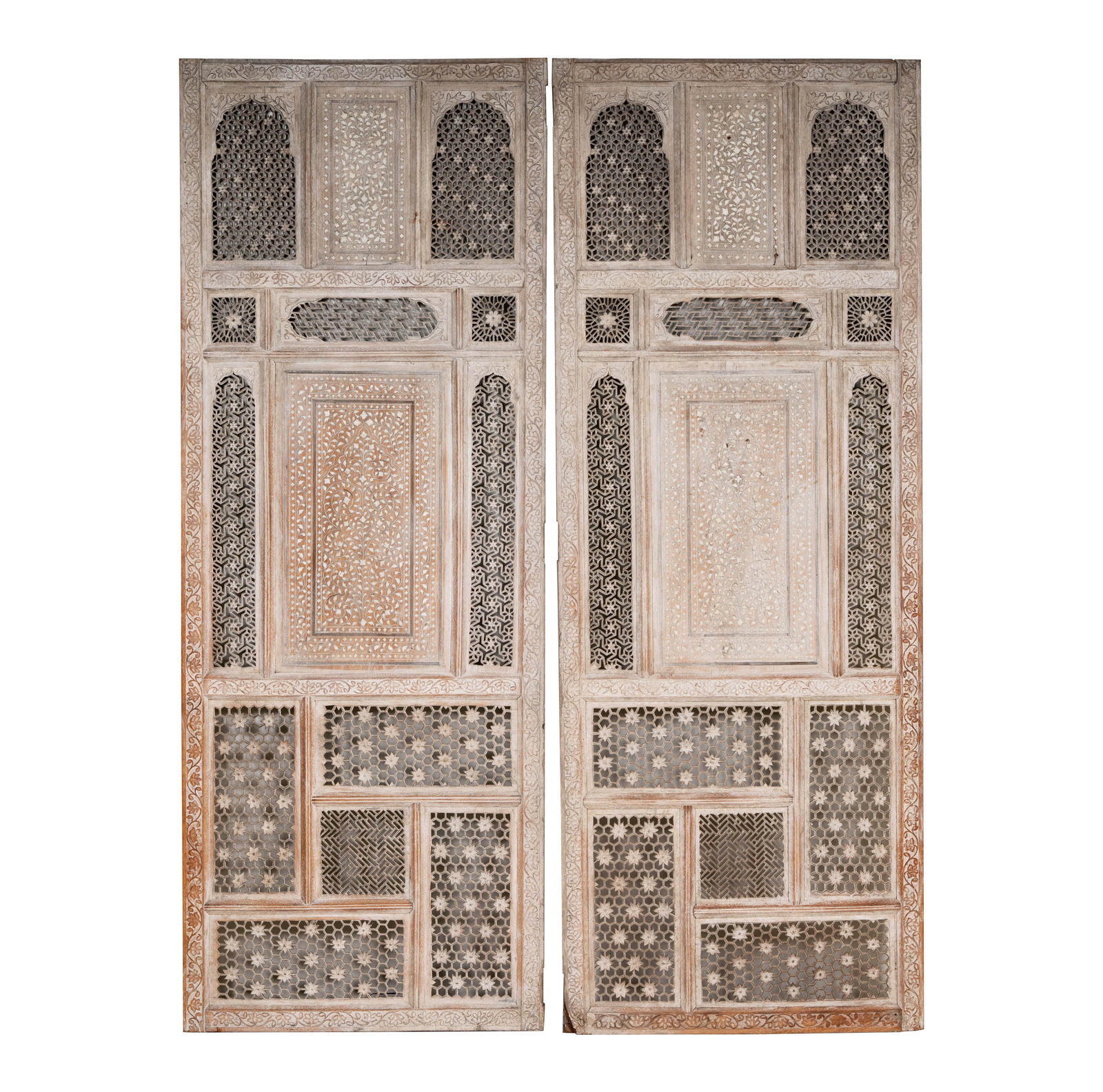 A Pair of Syrian Inlaid Wood Panels: each carved and pierced 61 1/2 x 23 in. (156.2 x 58.4 cm.) Provenance: An Important Private Southern California Estate
