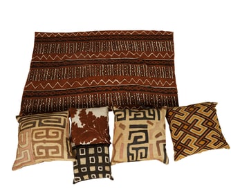 A Group of Kuba Cloth Throw Pillows