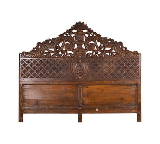 A Continental Carved Oak Headboard
