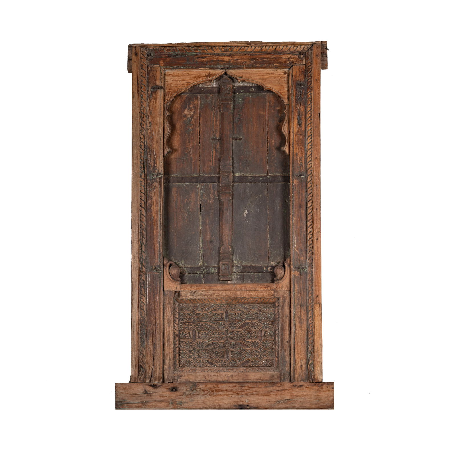 An Asian Carved Wood Window: early 20th century 65 x 38 in. (165.1 x 96.5 cm.)