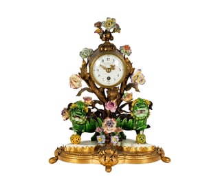A French Chinoiserie Porcelain and Gilt Bronze Mantel Clock