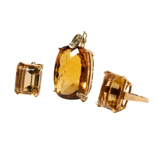 One 14 Karat Yellow Gold Citrine Ring and Two Pendants